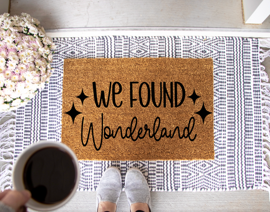 We Found Wonderland Doormat